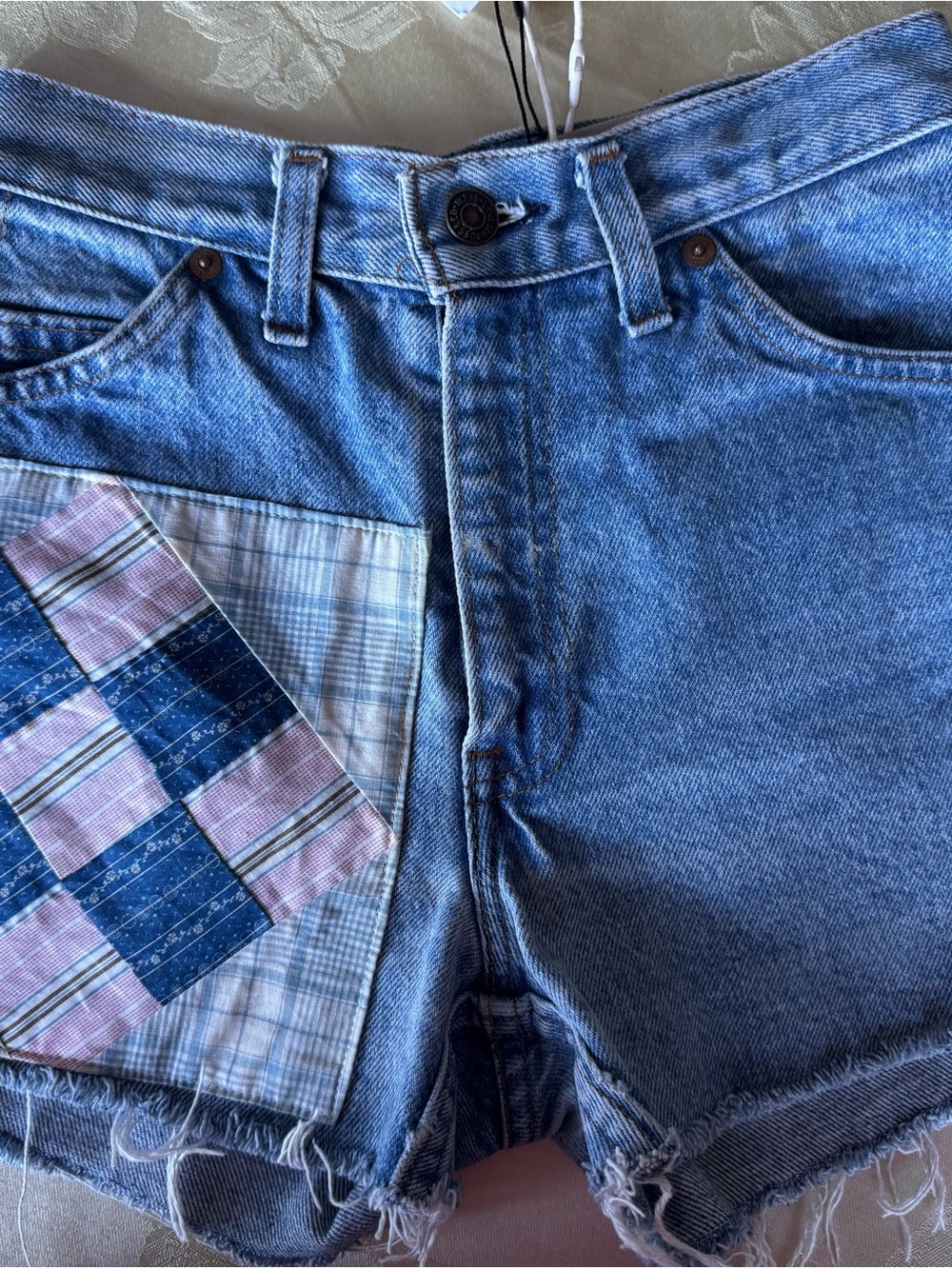 Denim Cutoff Shorts in Light Blue with Patch Detail Levi’s brand new